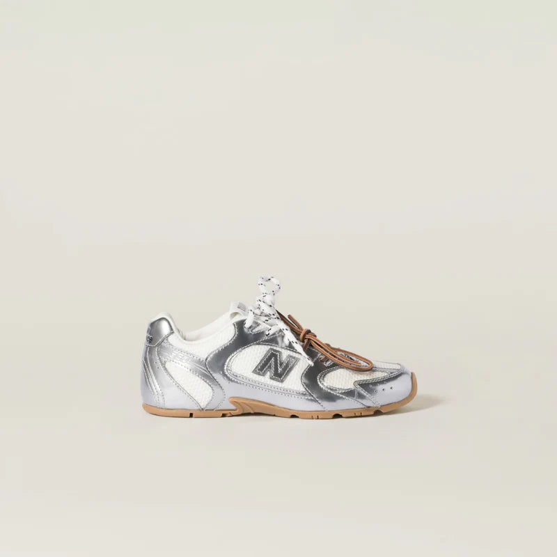 NB x Miu Miu 530 SL metallic leather and mesh sneakers Women