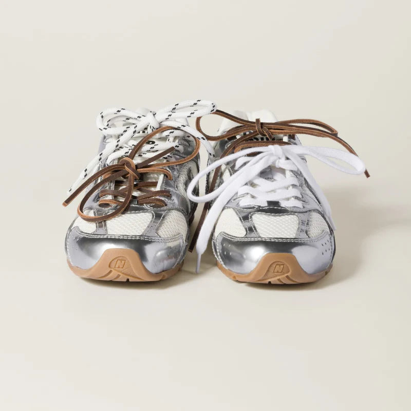 NB x Miu Miu 530 SL metallic leather and mesh sneakers Women