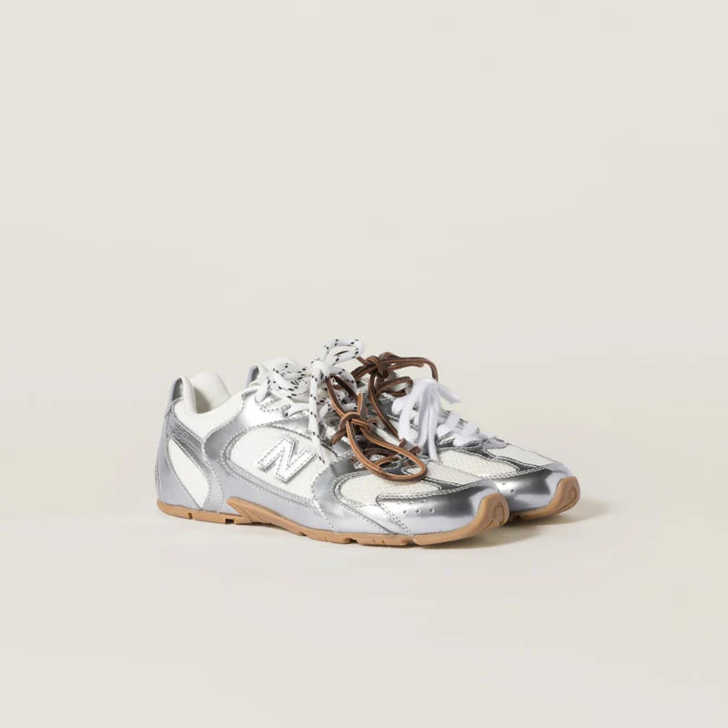 NB x Miu Miu 530 SL metallic leather and mesh sneakers Women