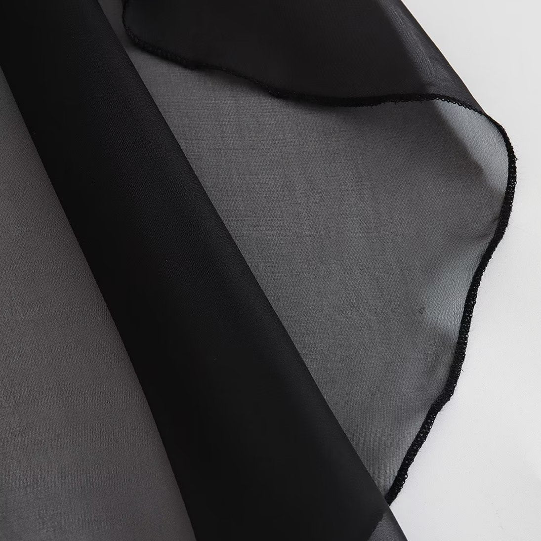 Blusa Capa Assimétrica