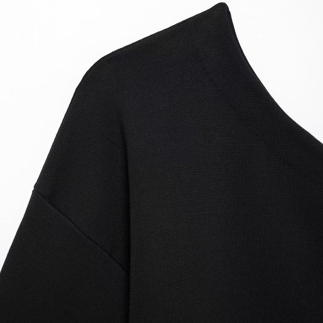 Blusa de Tricô Assimétrica Sienna