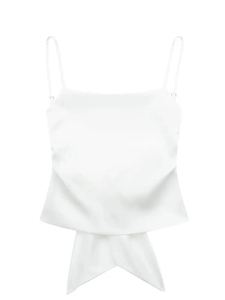 Blusa Perri com alças finas, laço e abertura nas costas. Modelo em alfaiataria, nas cores preto e branco, do PP ao G.

