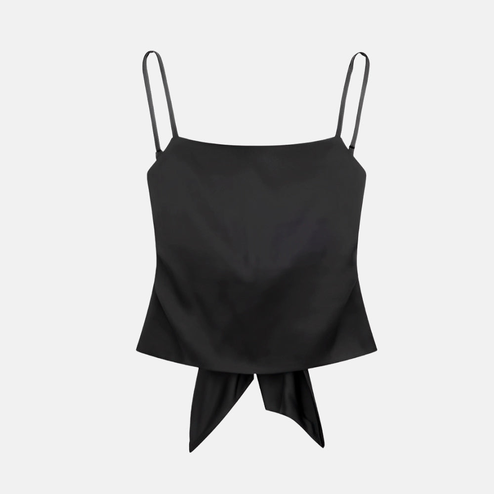 Blusa Perri com alças finas, laço e abertura nas costas. Modelo em alfaiataria, nas cores preto e branco, do PP ao G.

