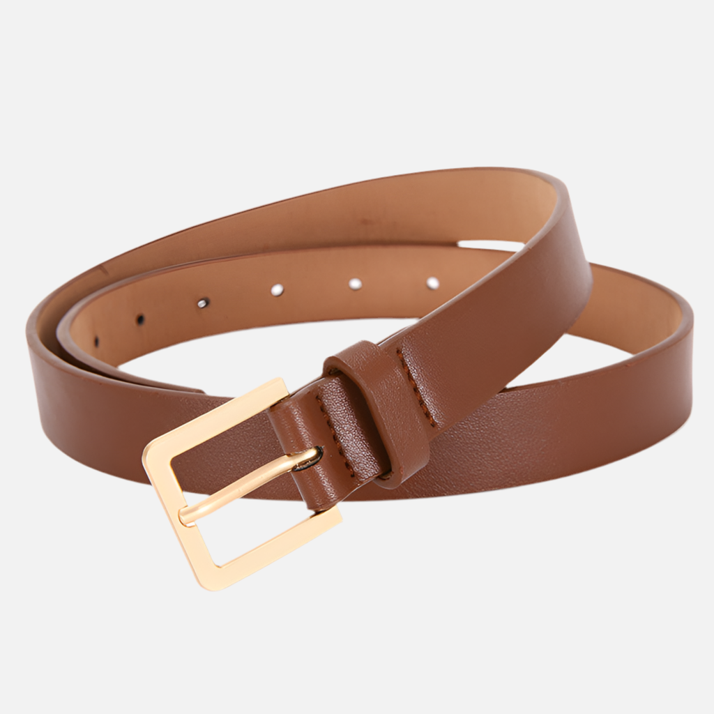 Cinto feminino Essential em couro sintético com fivela dourada. Minimalista, elegante e ajustável para diferentes estilos e ocasiões.