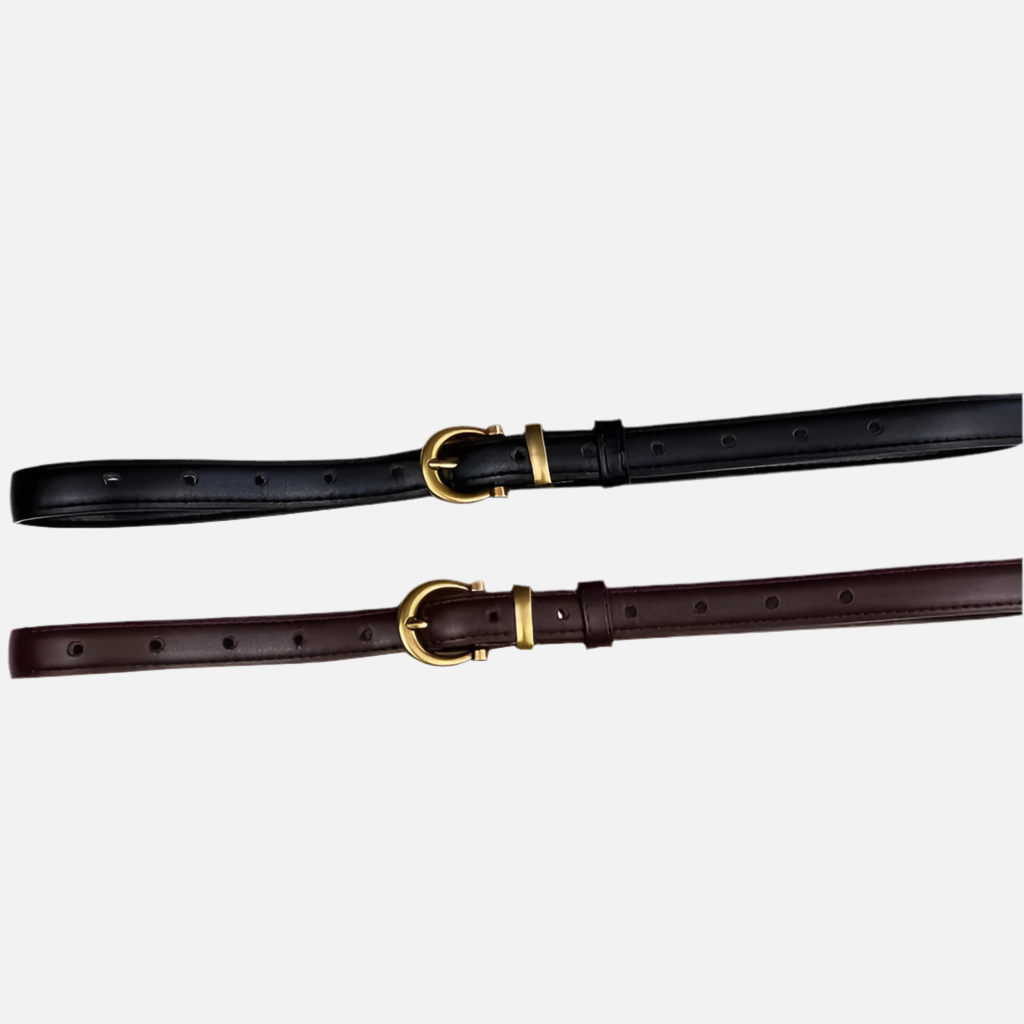 Cinto feminino minimalista em couro sintético, com fivela dourada elegante e design atemporal, ideal para compor looks modernos e sofisticados.

