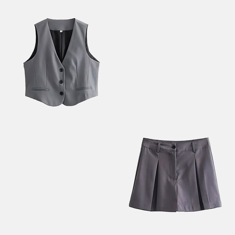 Conjunto Celine com colete sem mangas e short saia em alfaiataria cinza. Sofisticação do P ao G.

