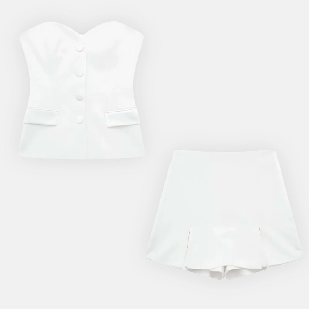 Conjunto Lya com colete tomara que caia e saia com fenda. Alfaiataria elegante nas cores branco e preto, do PP ao G.

