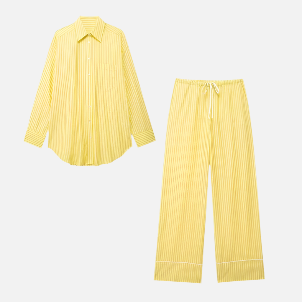Conjunto Bora Bora listrado em amarelo e branco com camisa oversized e calça reta. Look leve, ideal para o verão.

