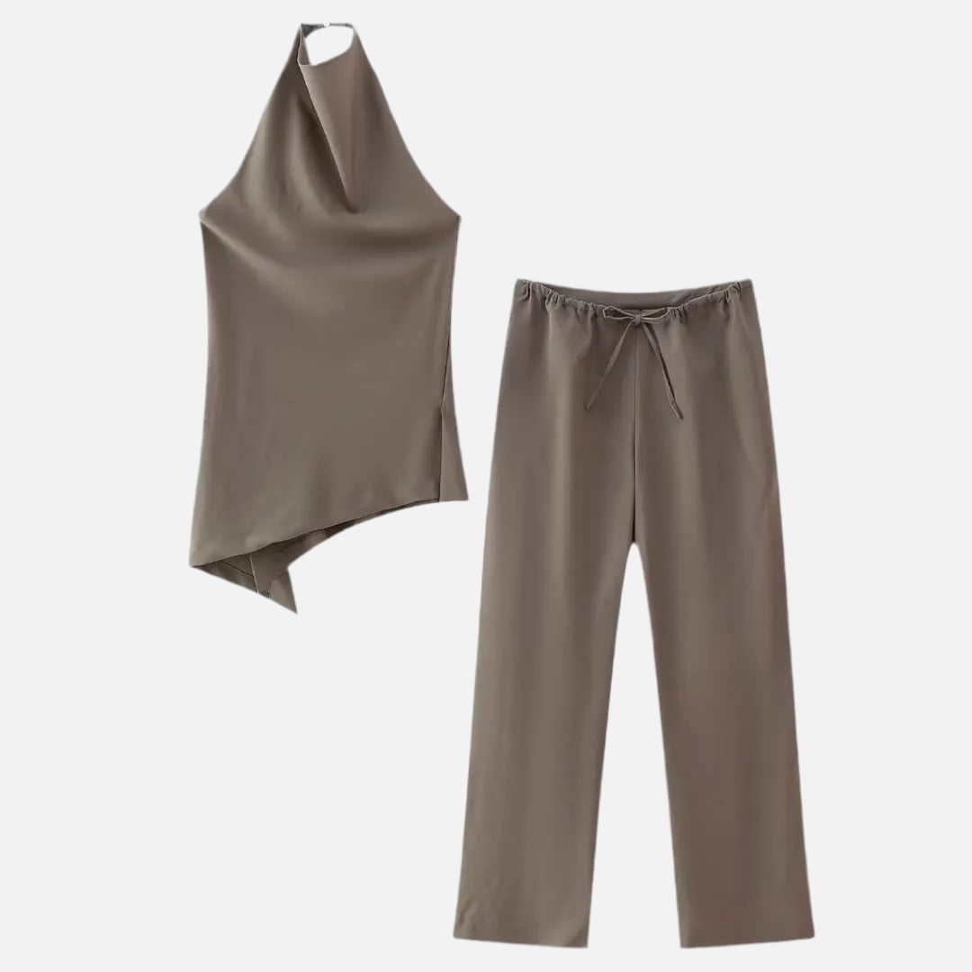 Conjunto Mica com top assimétrico e calça com amarração. Look fashionista em marrom ou preto.

