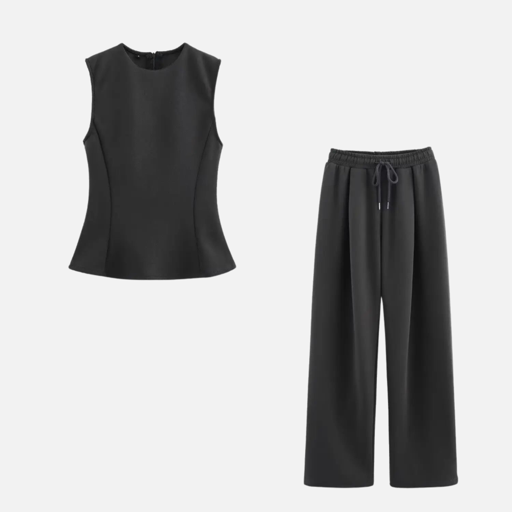 Conjunto Eleonor em moletom com blusa peplum e calça reta. Estilo casual com toque elegante, disponível em tons sofisticados.

