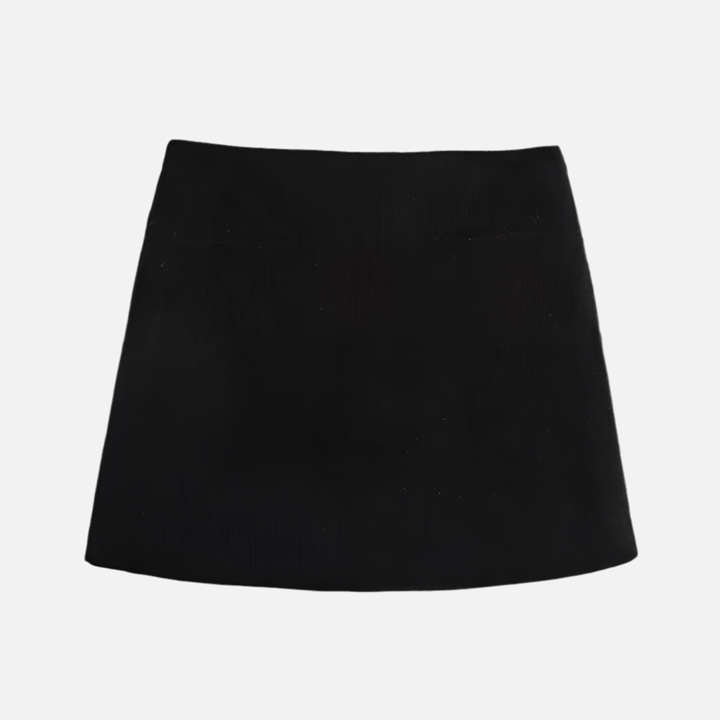 Saia Veludo Ava com corte reto, cintura alta e bolsos fake. Visual minimalista e elegante. Tamanhos PP ao GG. Cores: branco, marrom, preto e vinho.

